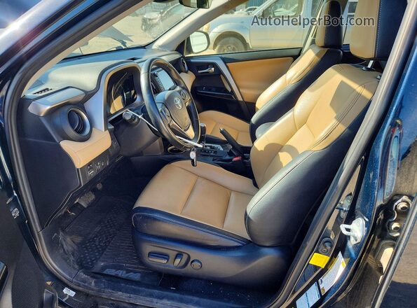 JTMDJREV6JD237772 2018 TOYOTA RAV4 Blue Widok wnętrza z przodu