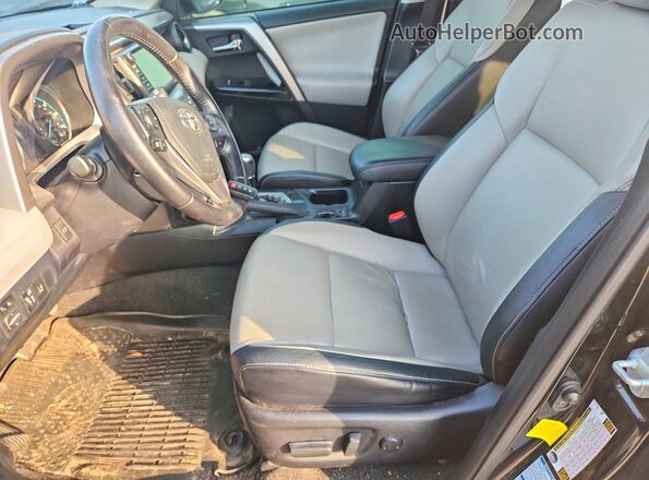 JTMDJREV7GD025942 2016 TOYOTA RAV4 Black Widok wnętrza z przodu