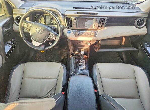 JTMDJREV7GD025942 2016 TOYOTA RAV4 Black Widok deski rozdzielczej