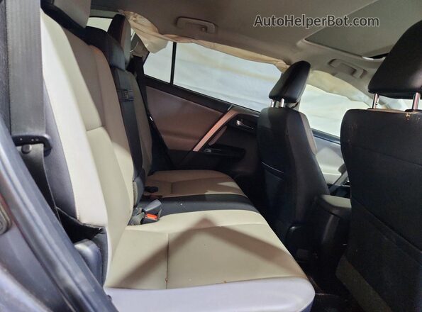 JTMDJREV7GD048914 2016 TOYOTA RAV4 Gray Вид задньої частини салону