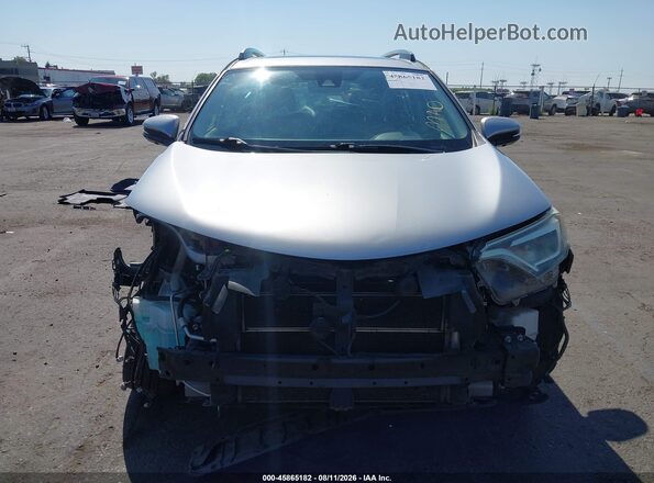 JTMDJREV7HD151249 2017 TOYOTA RAV4 HYBRID Silver Вид задньої частини салону