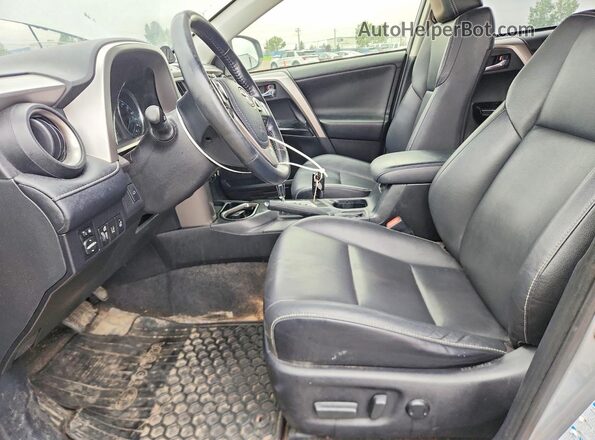 JTMDJREV7JD201444 2018 TOYOTA RAV4 Silver Front interior view
