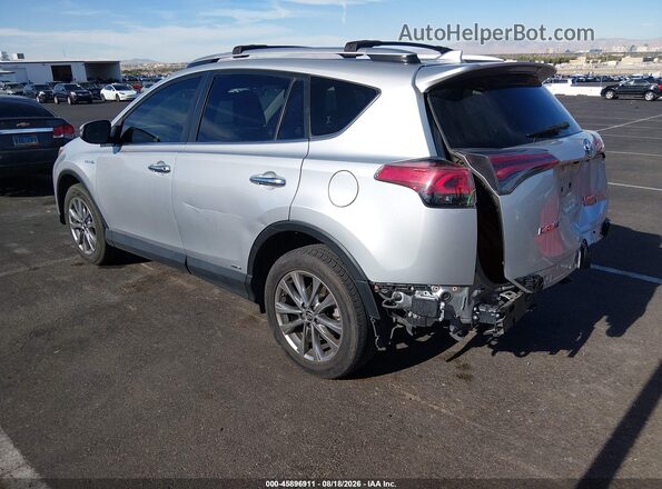 JTMDJREV9GD026137 2016 TOYOTA RAV4 HYBRID Silver Tył lewy