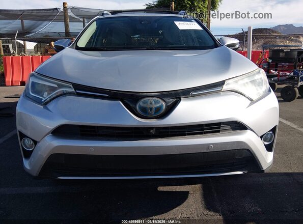 JTMDJREV9GD026137 2016 TOYOTA RAV4 HYBRID Silver Widok wnętrza z tyłu