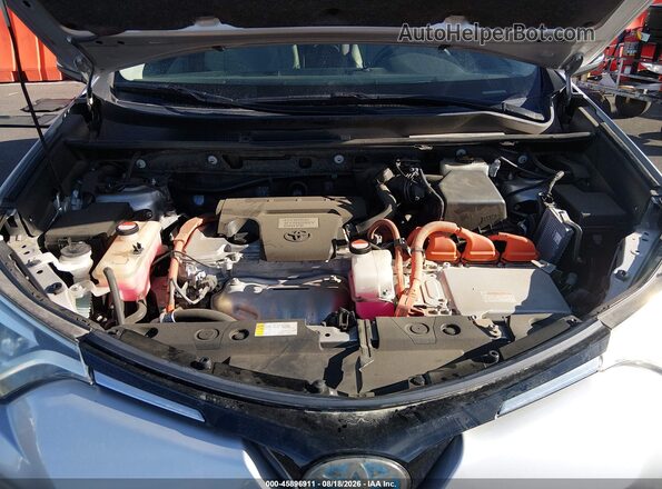 JTMDJREV9GD026137 2016 TOYOTA RAV4 HYBRID Silver Widok z tyłu