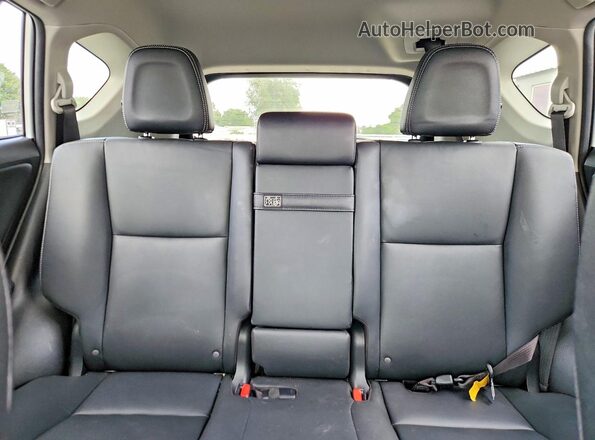 JTMDJREVXGD028706 2016 TOYOTA RAV4 White Rear seats view