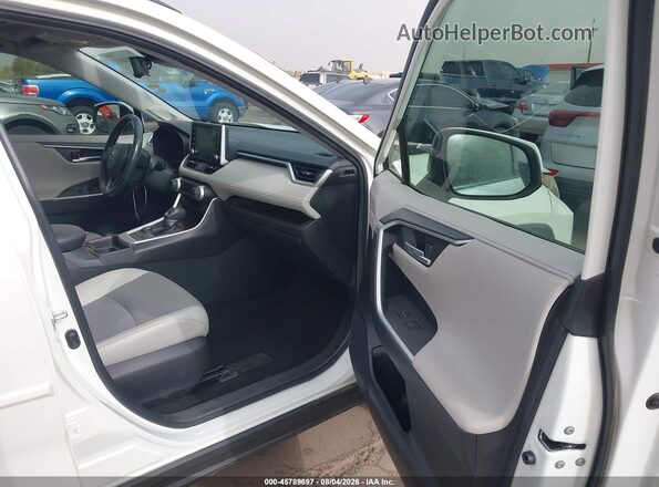 JTMDWRFV3KD021122 2019 TOYOTA RAV4 HYBRID White Front interior view