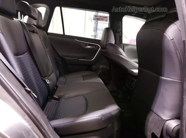 JTME6RFV2PD547706 2023 TOYOTA RAV4 Tan Вид задньої частини салону
