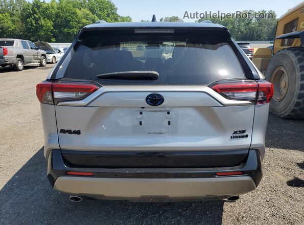 JTME6RFV5ND521839 2022 TOYOTA RAV4 Silver Widok z tyłu