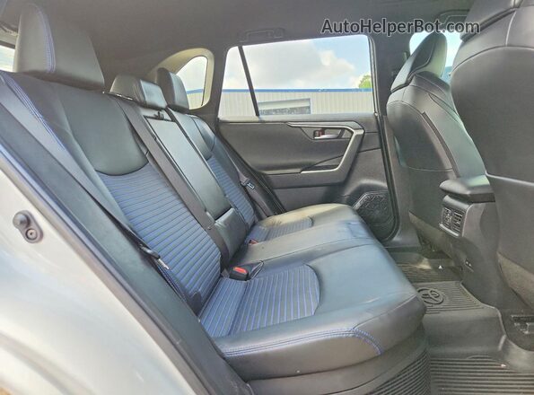 JTME6RFV9PJ032803 2023 TOYOTA RAV4 White Vista interior trasera