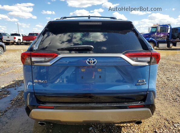 JTME6RFV9PJ039072 2023 TOYOTA RAV4 Blue Вид ззаду