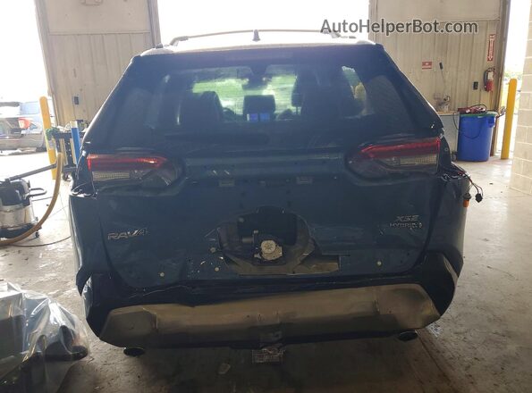 JTME6RFVXPD543922 2023 TOYOTA RAV4 Blue Rear view
