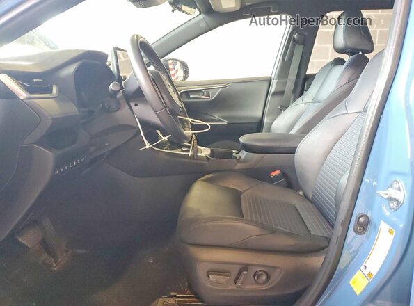 JTME6RFVXPD543922 2023 TOYOTA RAV4 Blue Front interior view