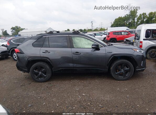 JTMEWRFV5KJ021709 2019 TOYOTA RAV4 HYBRID Gray Vista interior trasera