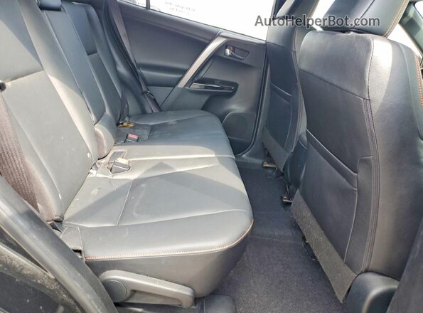 JTMJFREV0GJ077192 2016 TOYOTA RAV4 Black Rear interior view