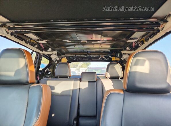 JTMJFREV1GD183679 2016 TOYOTA RAV4 Black Rear seats view