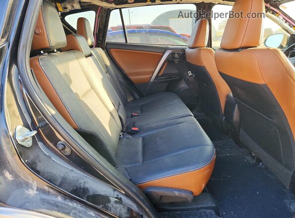 JTMJFREV1GD183679 2016 TOYOTA RAV4 Black Rear interior view