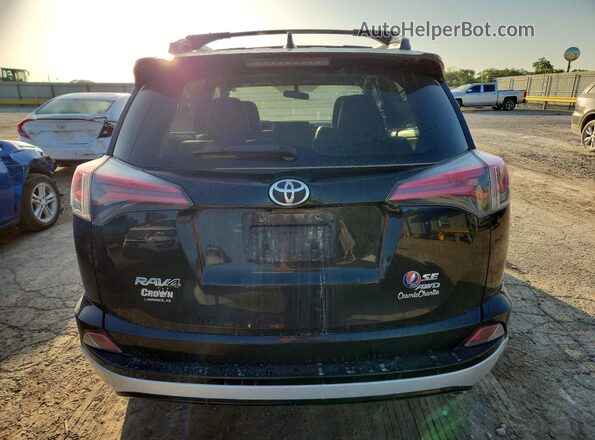 JTMJFREV1GD183679 2016 TOYOTA RAV4 Black Rear view