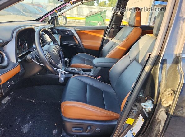 JTMJFREV1GD183679 2016 TOYOTA RAV4 Black Front interior view