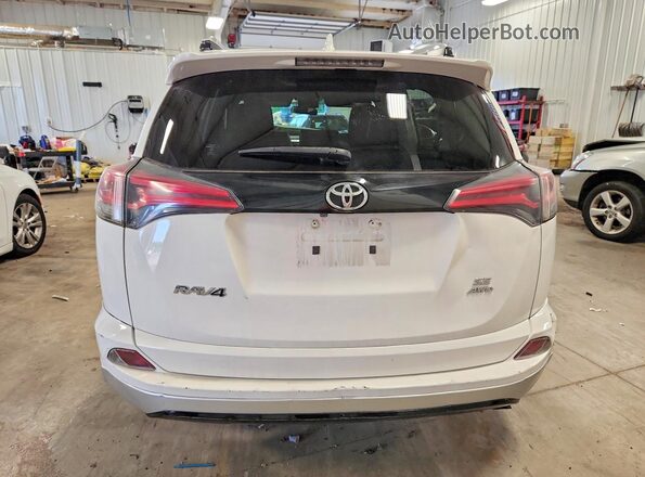 JTMJFREV1GJ066167 2016 TOYOTA RAV4 White Rear view
