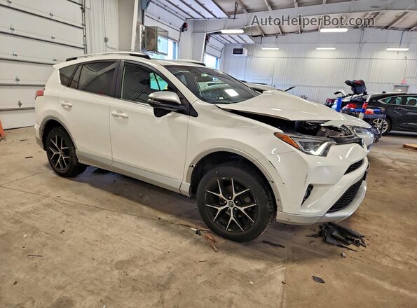 JTMJFREV1GJ066167 2016 TOYOTA RAV4 White Front right
