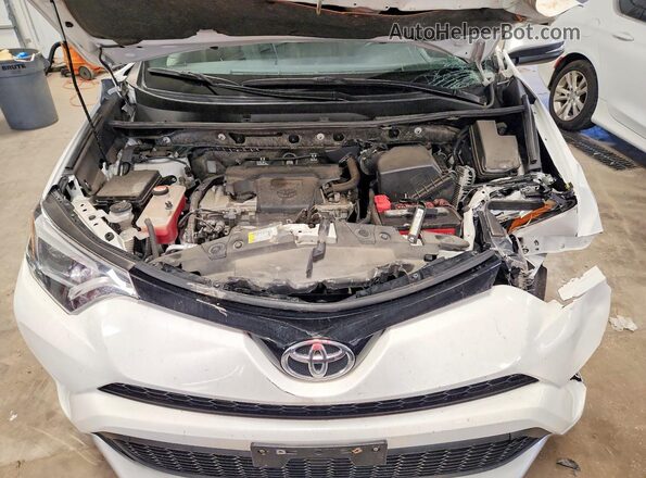 JTMJFREV1GJ066167 2016 TOYOTA RAV4 White Rear interior view