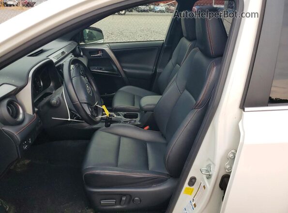 JTMJFREV1GJ066167 2016 TOYOTA RAV4 White Front interior view