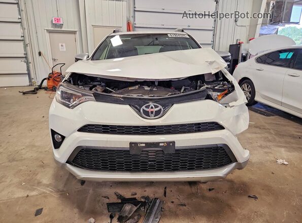 JTMJFREV1GJ066167 2016 TOYOTA RAV4 White Front view