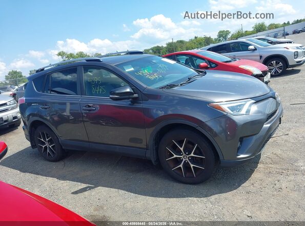 JTMJFREV1HJ701180 2017 TOYOTA RAV4 Gray უკანა სალონის ხედი