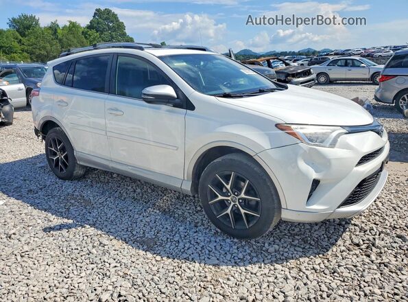 JTMJFREV8GJ077814 2016 TOYOTA RAV4 White Front right