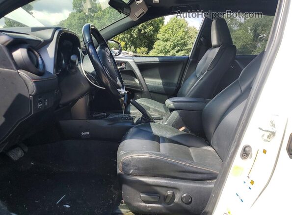 JTMJFREV8GJ077814 2016 TOYOTA RAV4 White Front interior view