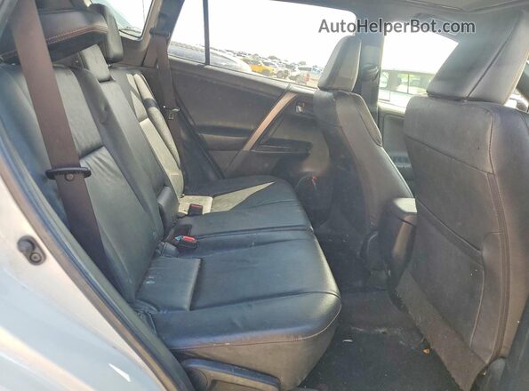 JTMJFREV8GJ077814 2016 TOYOTA RAV4 White Rear interior view