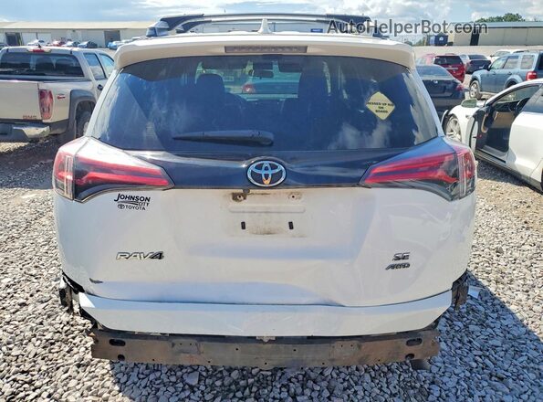 JTMJFREV8GJ077814 2016 TOYOTA RAV4 White Rear view