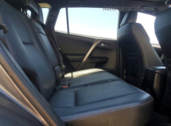 JTMJJREV3JD229504 2018 TOYOTA RAV4 Серый Вид задней части салона