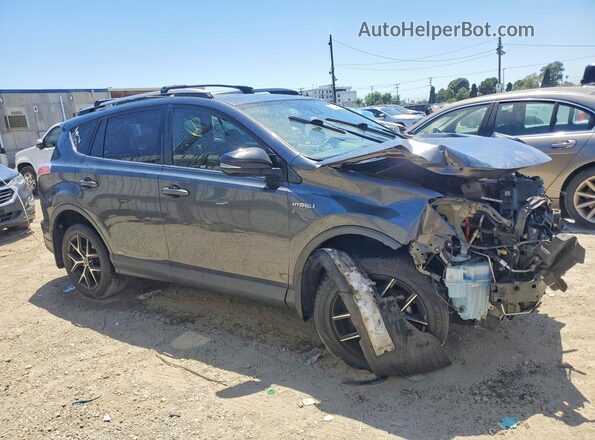 JTMJJREV3JD229504 2018 TOYOTA RAV4 Серый Передняя правая четверть