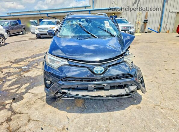 JTMJJREV9JD208253 2018 TOYOTA RAV4 Black Front view