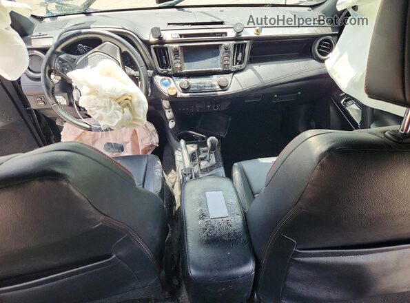 JTMJJREV9JD208253 2018 TOYOTA RAV4 Black Dashboard view