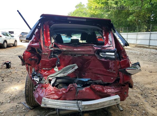 JTMLWRFV5PD174264 2023 TOYOTA RAV4 Red Rear view