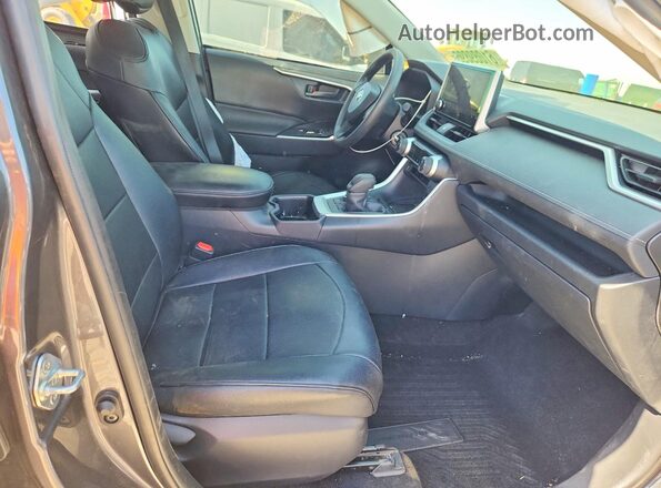 JTMLWRFV5SD292355 2025 TOYOTA RAV4 Gray წინა სალონის ხედი