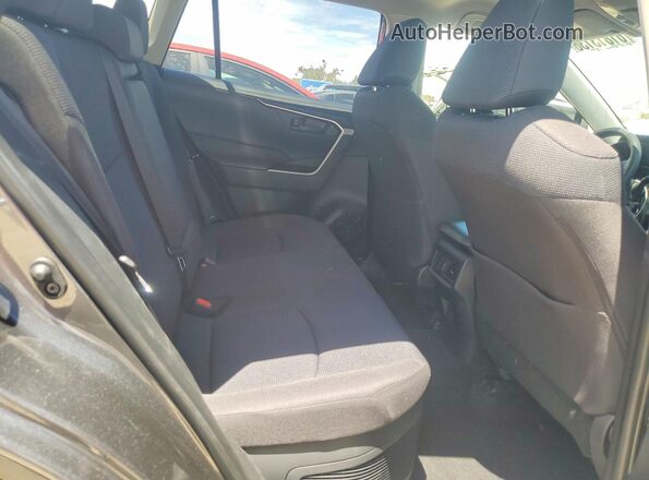 JTMMWRFV0SD308529 2025 TOYOTA RAV4 Charcoal Vista interior trasera