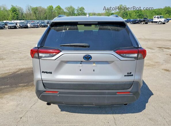 JTMMWRFV6PD186105 2023 TOYOTA RAV4 Silver Widok z tyłu