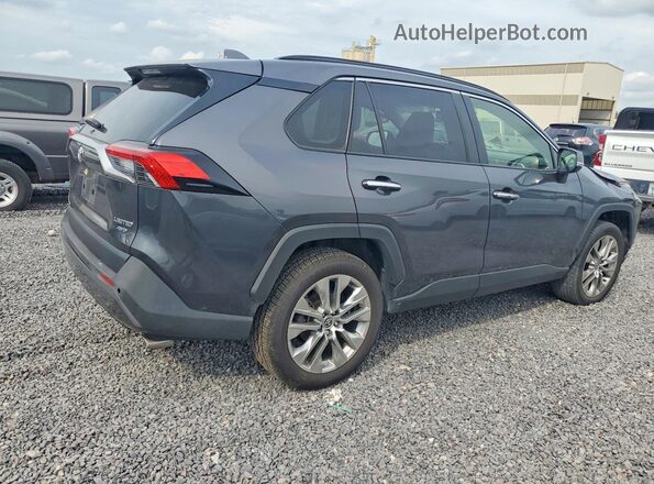 JTMN1RFV0LJ035887 2020 TOYOTA RAV4 Gray Vista trasera