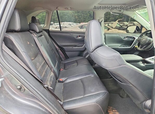 JTMN1RFV7KD039447 2019 TOYOTA RAV4 Charcoal Вид задньої частини салону