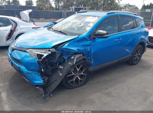 JTMNFREV3HD100577 2017 TOYOTA RAV4 Blue Vista tres cuartos delantera izquierda