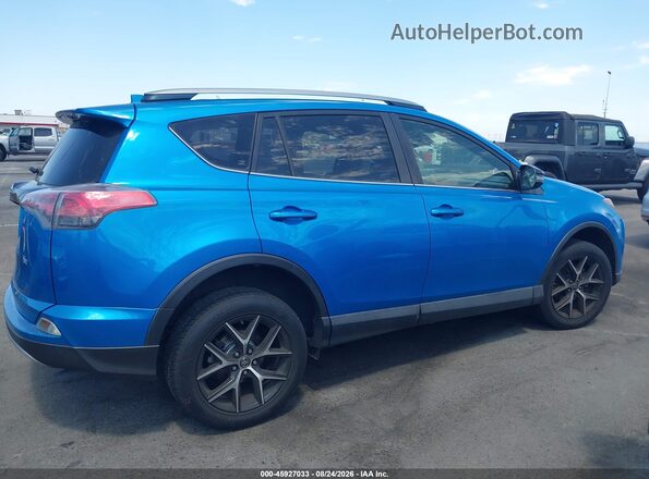 JTMNFREV3HD100577 2017 TOYOTA RAV4 Blue Vista interior trasera