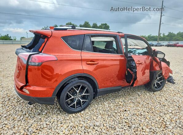 JTMNFREV6GJ090854 2016 TOYOTA RAV4 Orange Rear right
