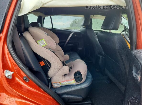 JTMNFREV6GJ090854 2016 TOYOTA RAV4 Orange Rear seats view