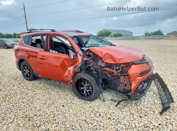 JTMNFREV6GJ090854 2016 TOYOTA RAV4 Orange Front right