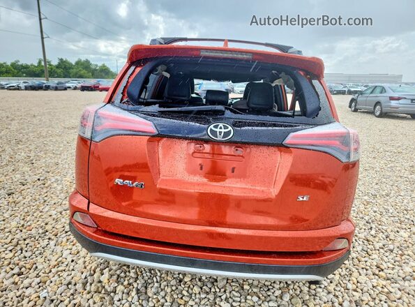 JTMNFREV6GJ090854 2016 TOYOTA RAV4 Orange Rear view