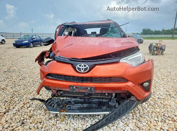 JTMNFREV6GJ090854 2016 TOYOTA RAV4 Orange Front view